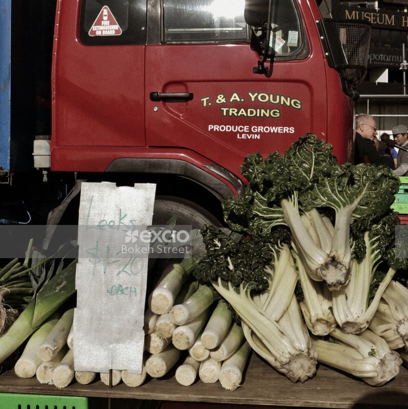 Green leeks and beta vulgaris for sale at fruit and vegetable market