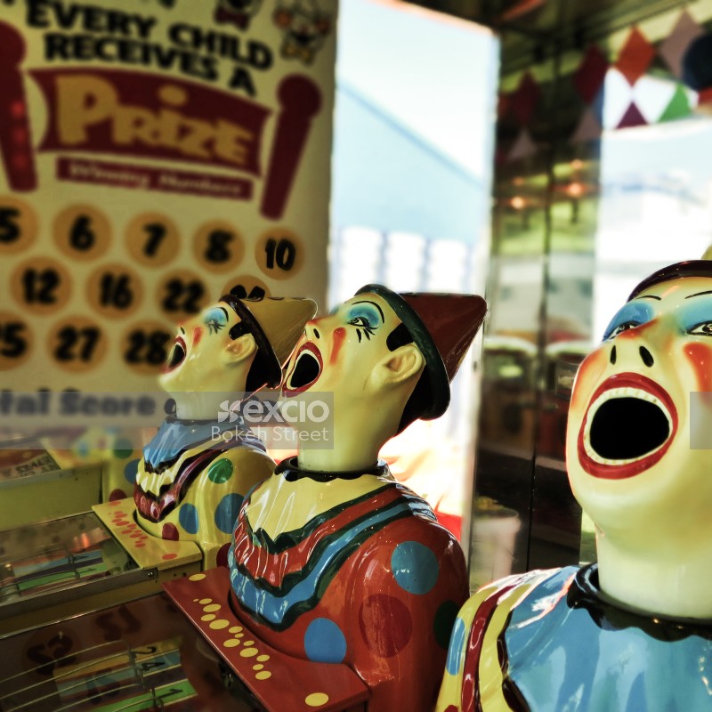 Target clown figurine game at a carnival
