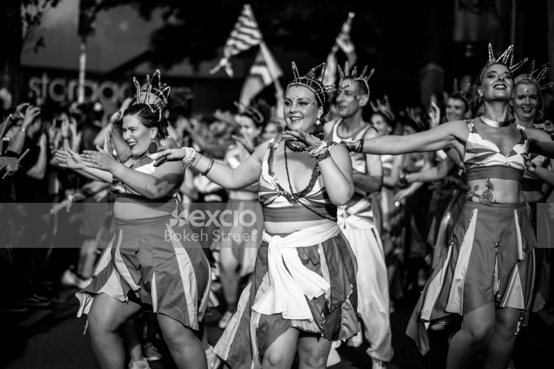 Group dancing in the street at Cuba Dupa 2021 bokeh black and white