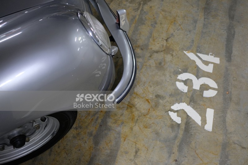 Classic silver Porsche fender headlight turn signal and bumper