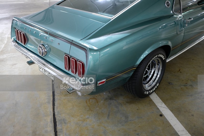 Classic teal Ford Mustand Mach 1 3rd quarter rear view
