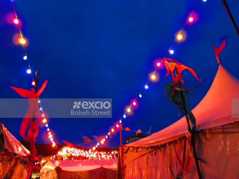 Vivid bunting lights at a fair in Wellington