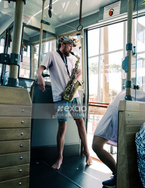 Musician on cable car