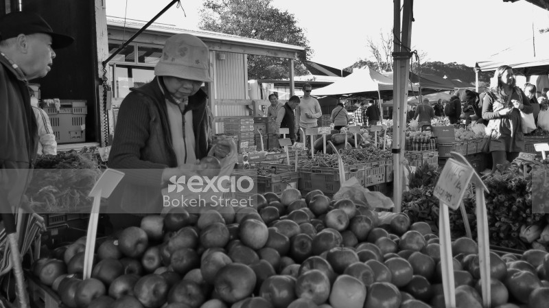 People at the local fruit & vegetable market monochrome