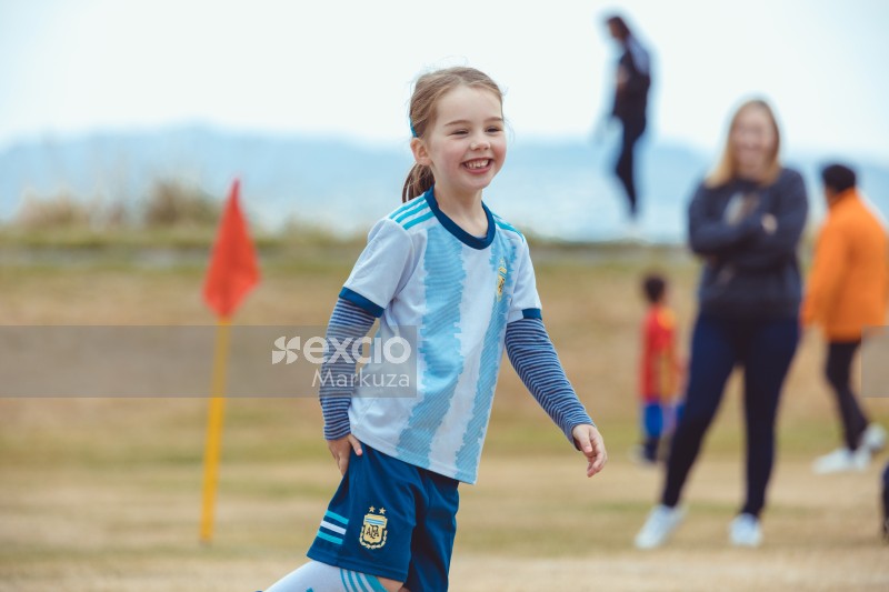 Little smiling girl in Argentine kit at Little Dribblers
