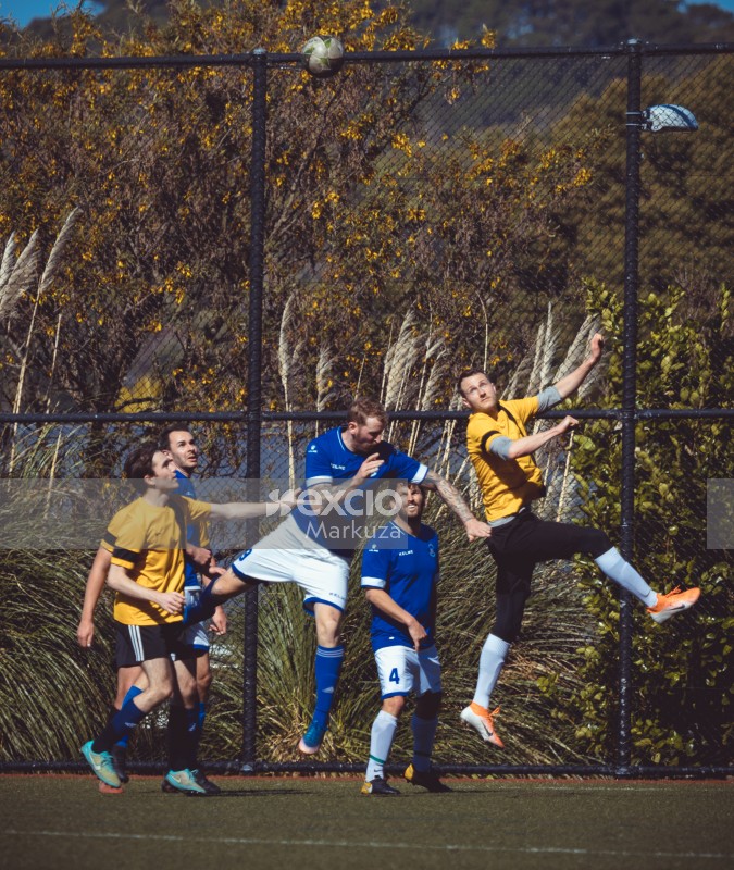 Ball flying high over player's heads - Sports Zone sunday league