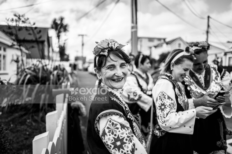 Portrait of a lady in an embroidered dress at Newtown festival 2021 bokeh monochrome
