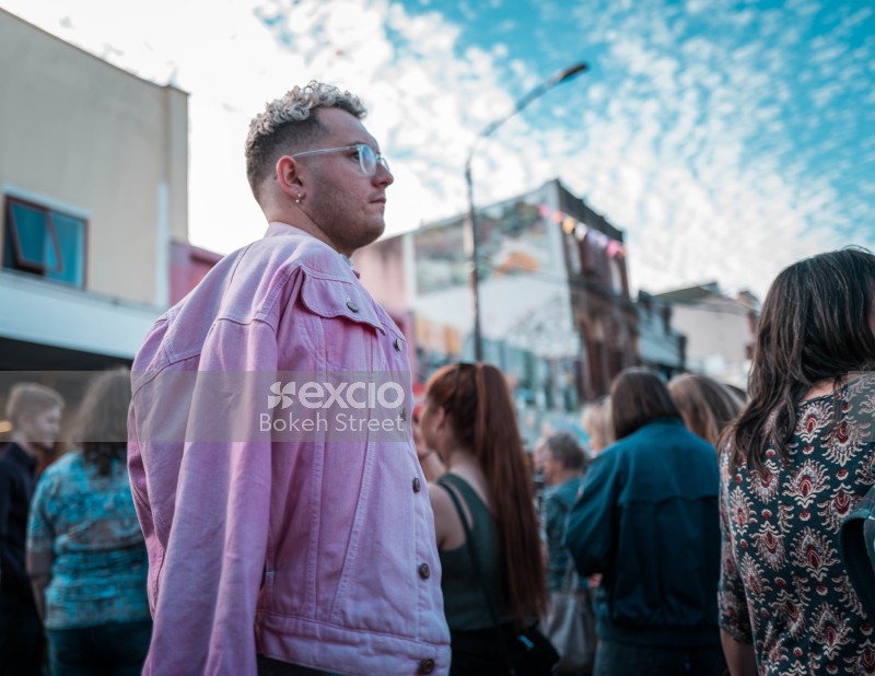 Man with pink jacket