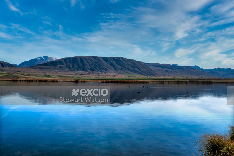 Reflections on a small Maori lake