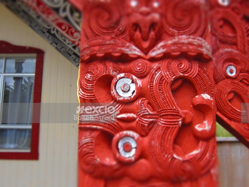 Maori ornament carving on marae building near Pukehina