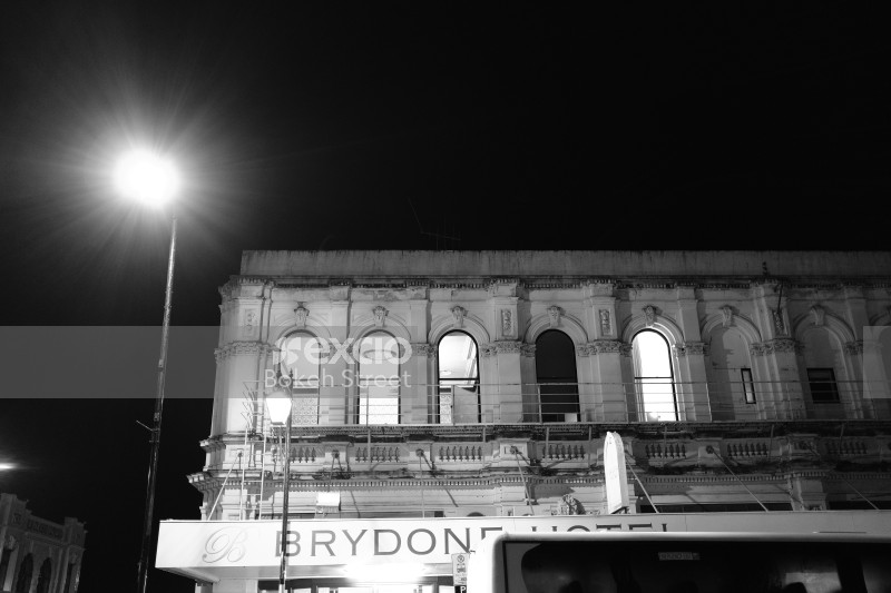 Building facade at night in Christchurch monochrome