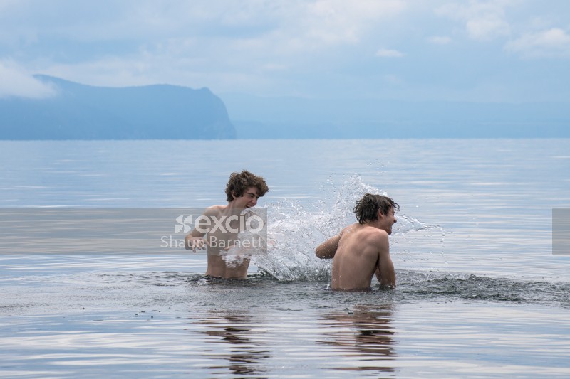 Boys swimming Lake Taupo