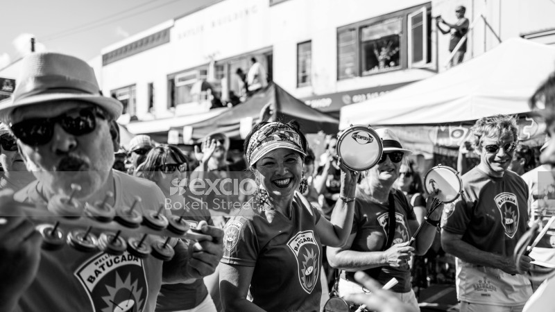 People parading with music instruments at Newtown Festival 2020 black and white