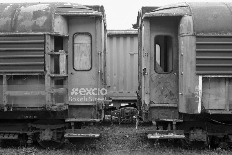Abandoned old passenger bogies monochrome