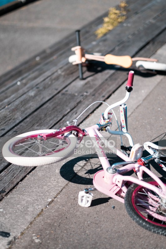 Laid down bicycles on ground