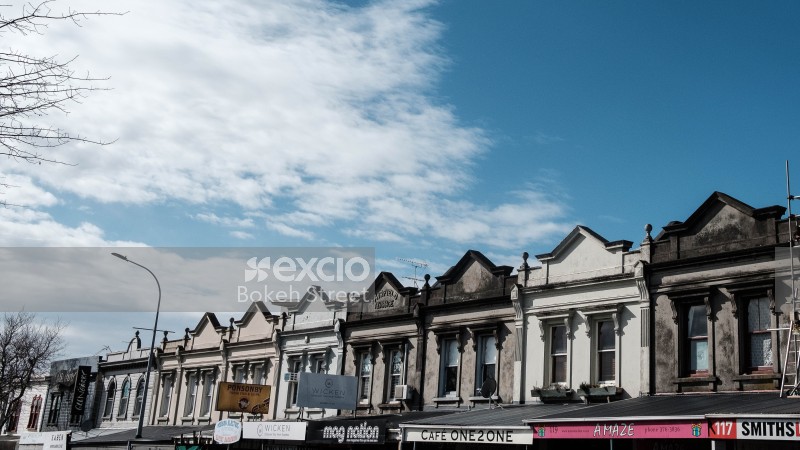 Blue sky and line-up of shops at Ponsonby street