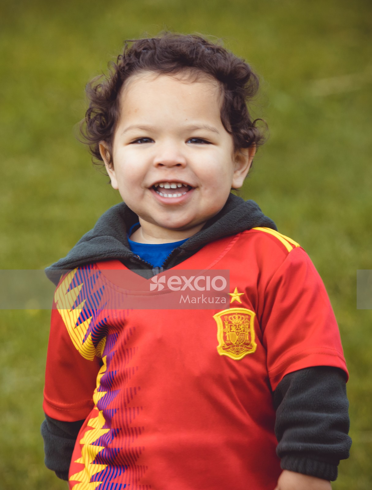 Portrait of boy wearing Manchester United football team jersey - Little Dribblers