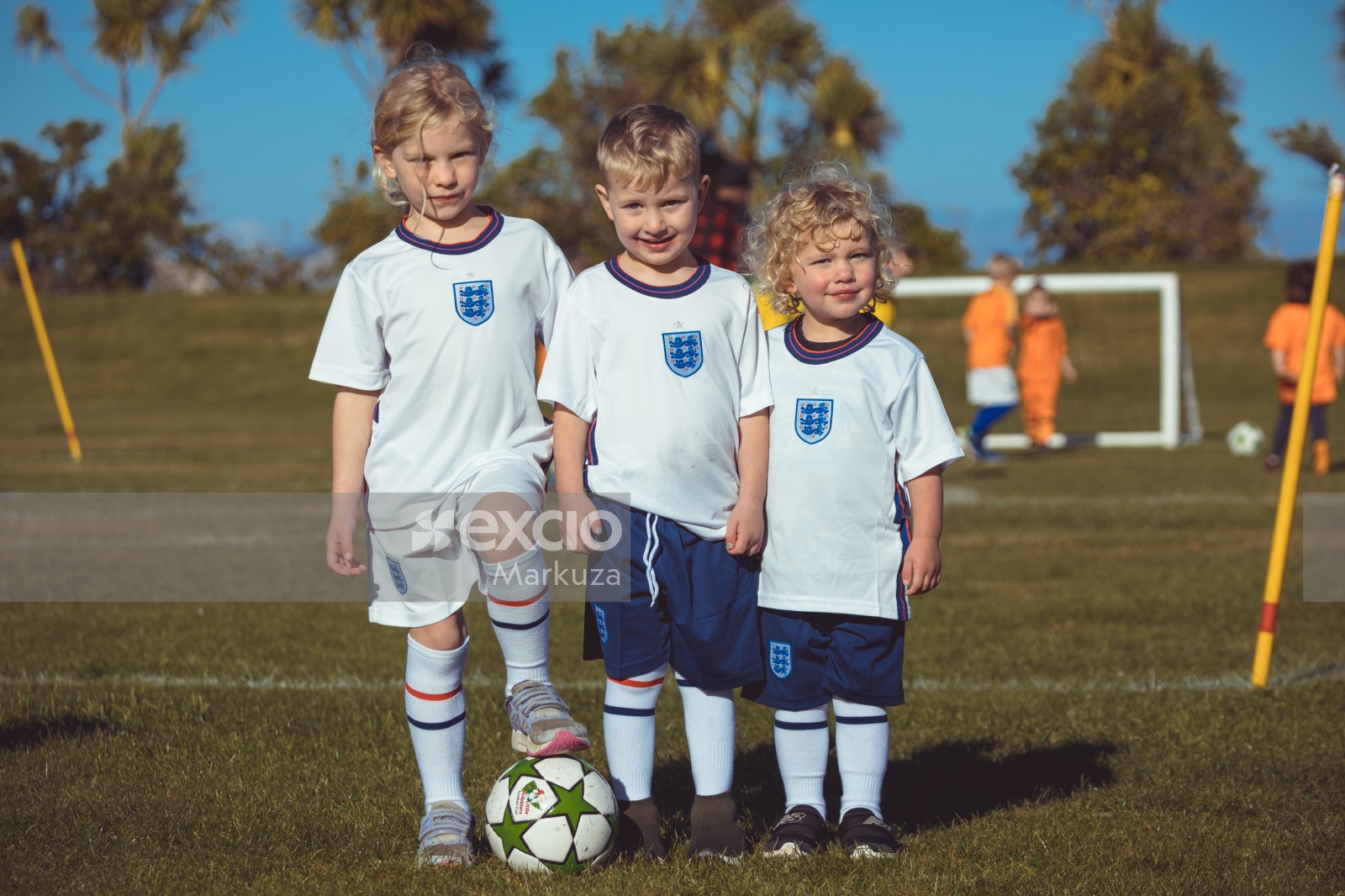 Three England kit teammates at Little Dribblers meet