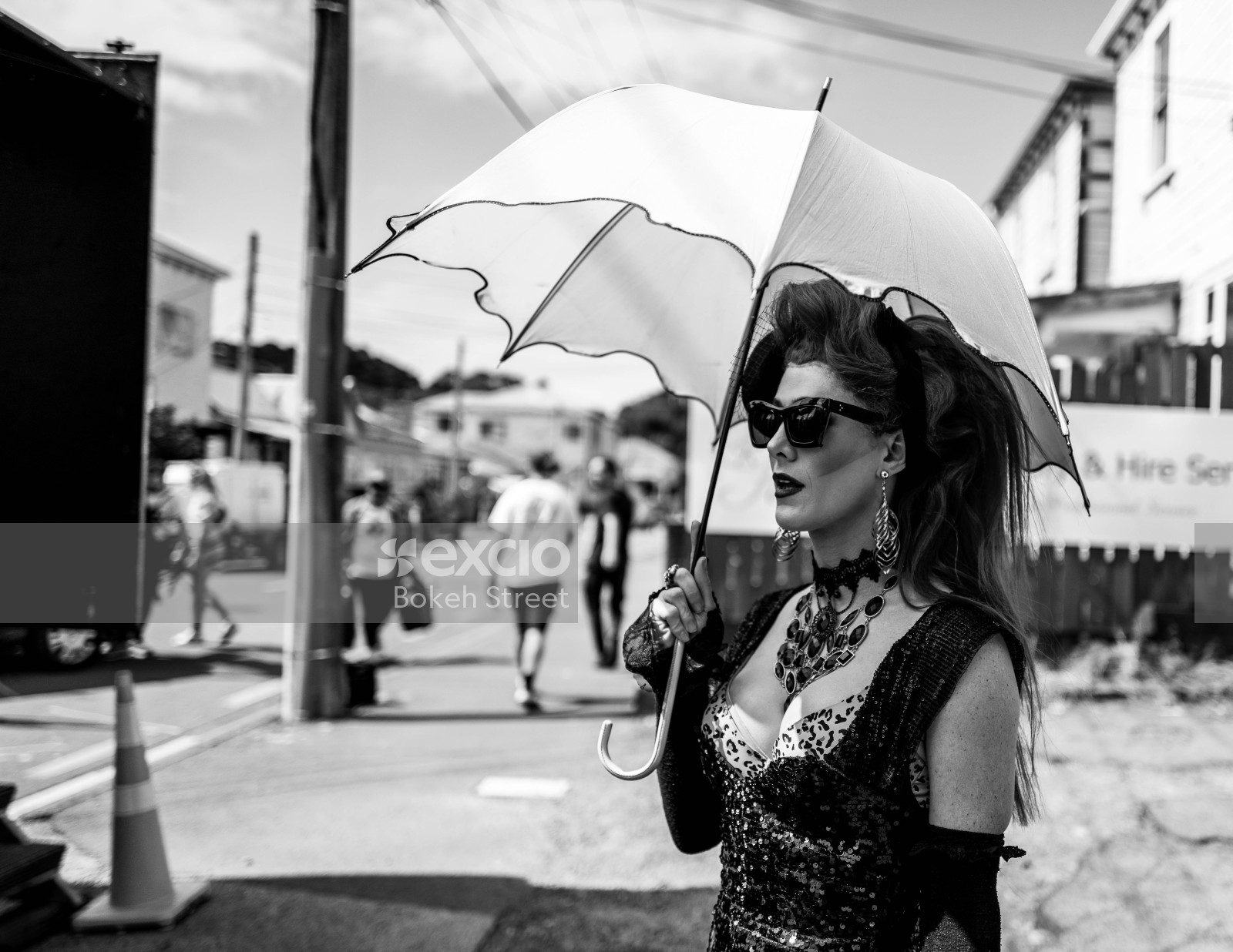 Woman with an umbrella at Newtown Festival 2020 black and white