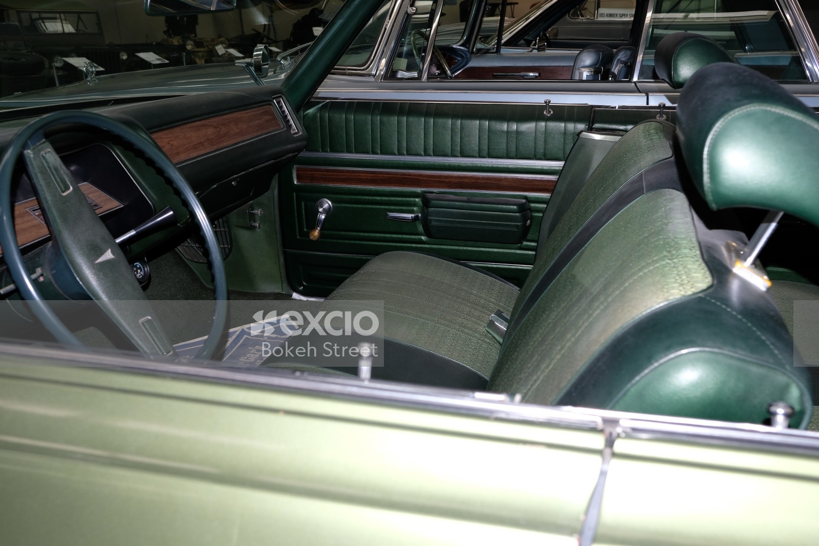 Classic green Pontiac interior bench seat manual windows