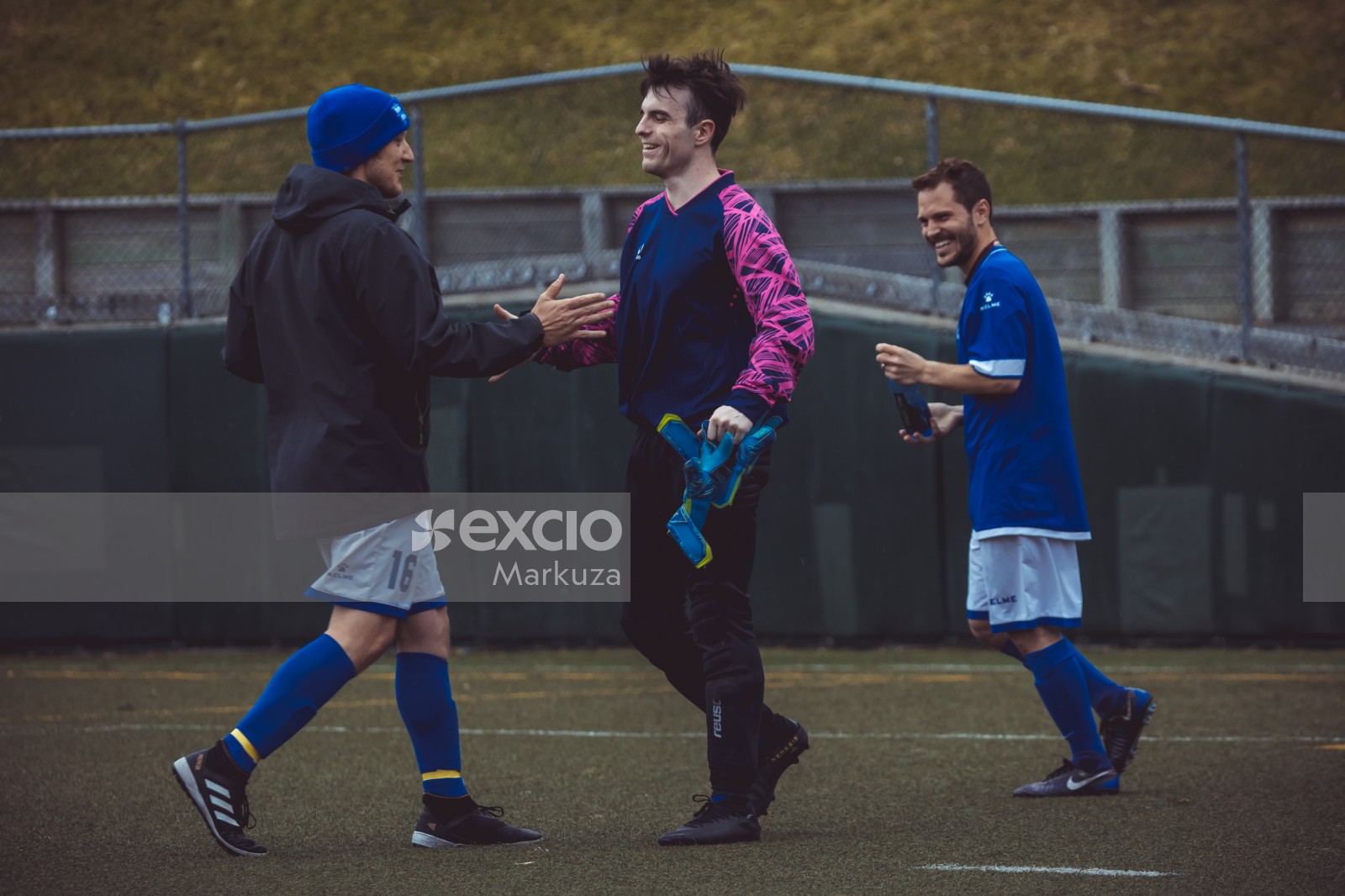 Two players greeting each other - Sports Zone sunday league