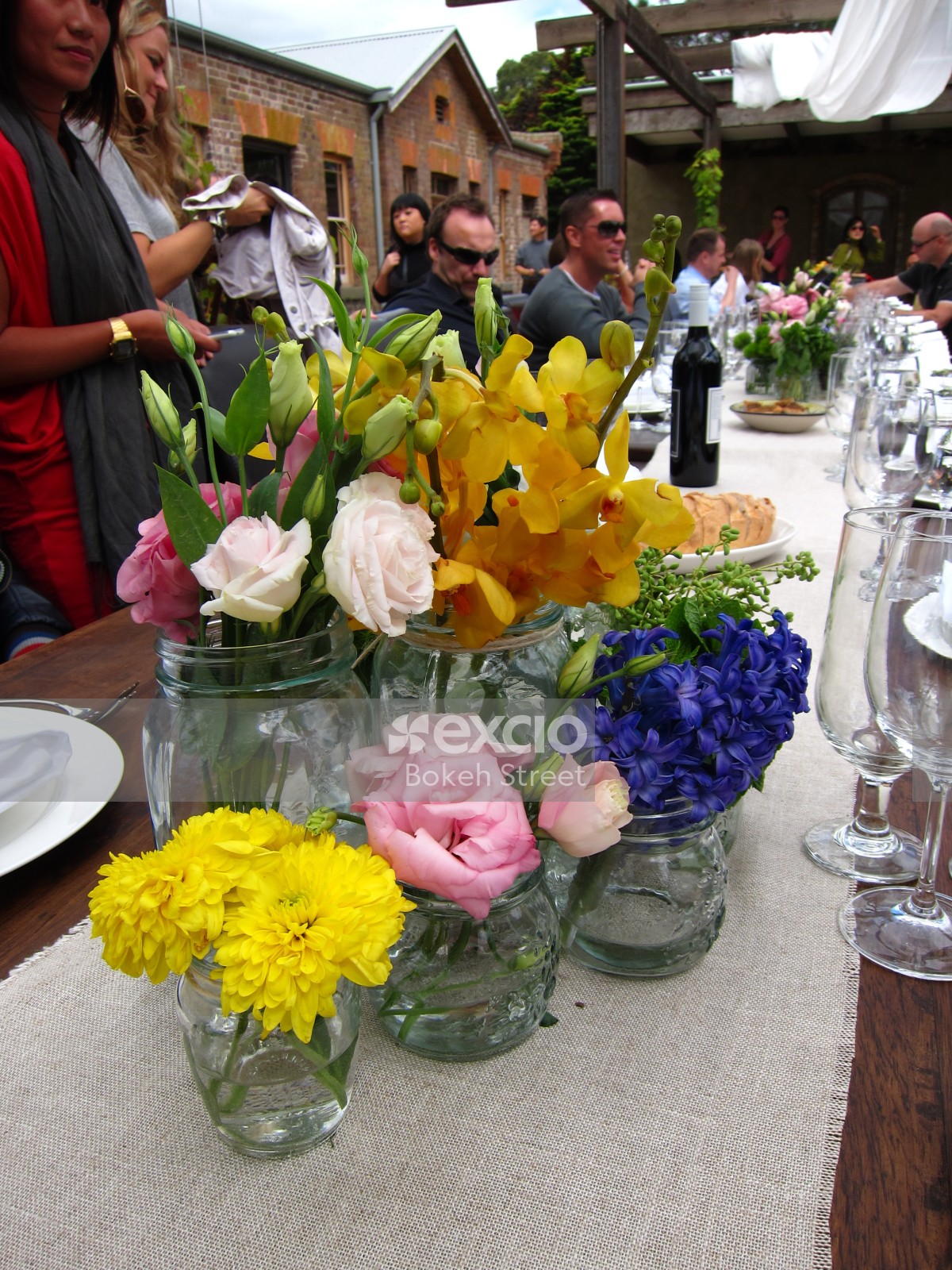 Flower arrangement on a table set outside