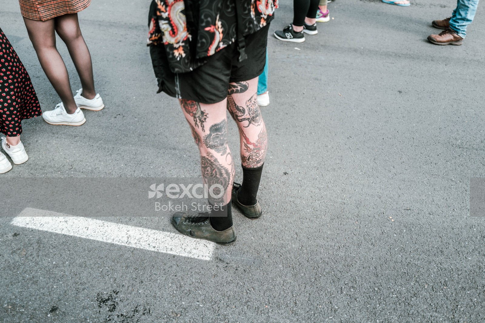 Tattooed legs at Newtown festival 2021