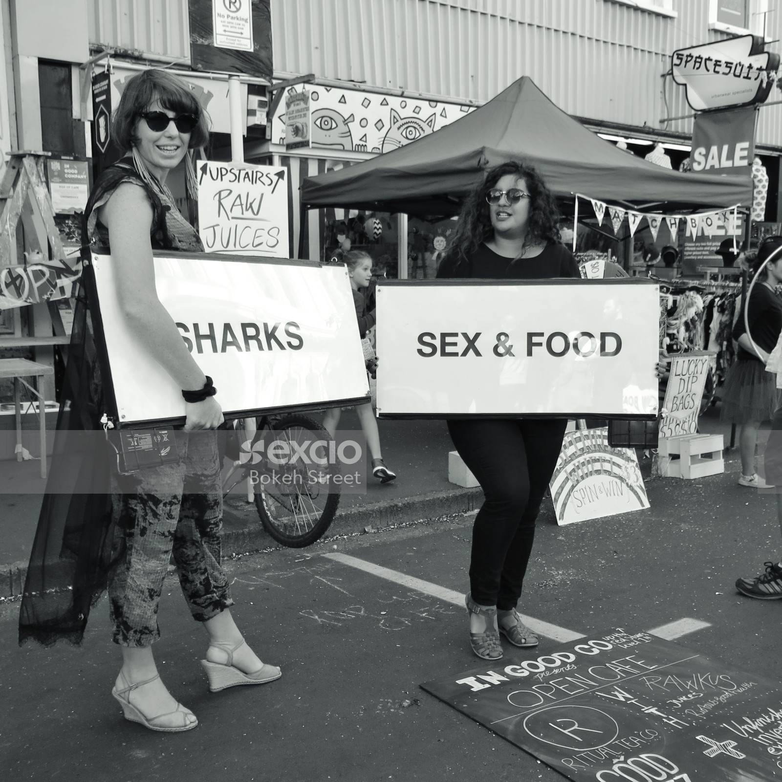 Women holding signs
