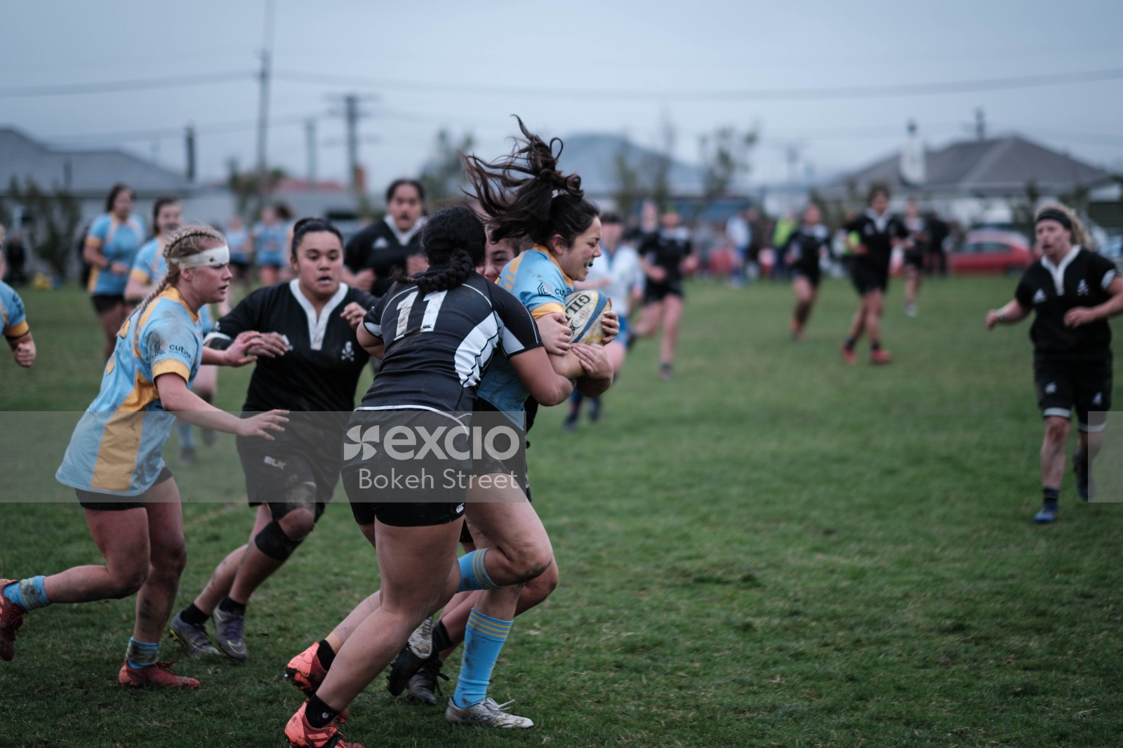 Women's rugby sports action shot