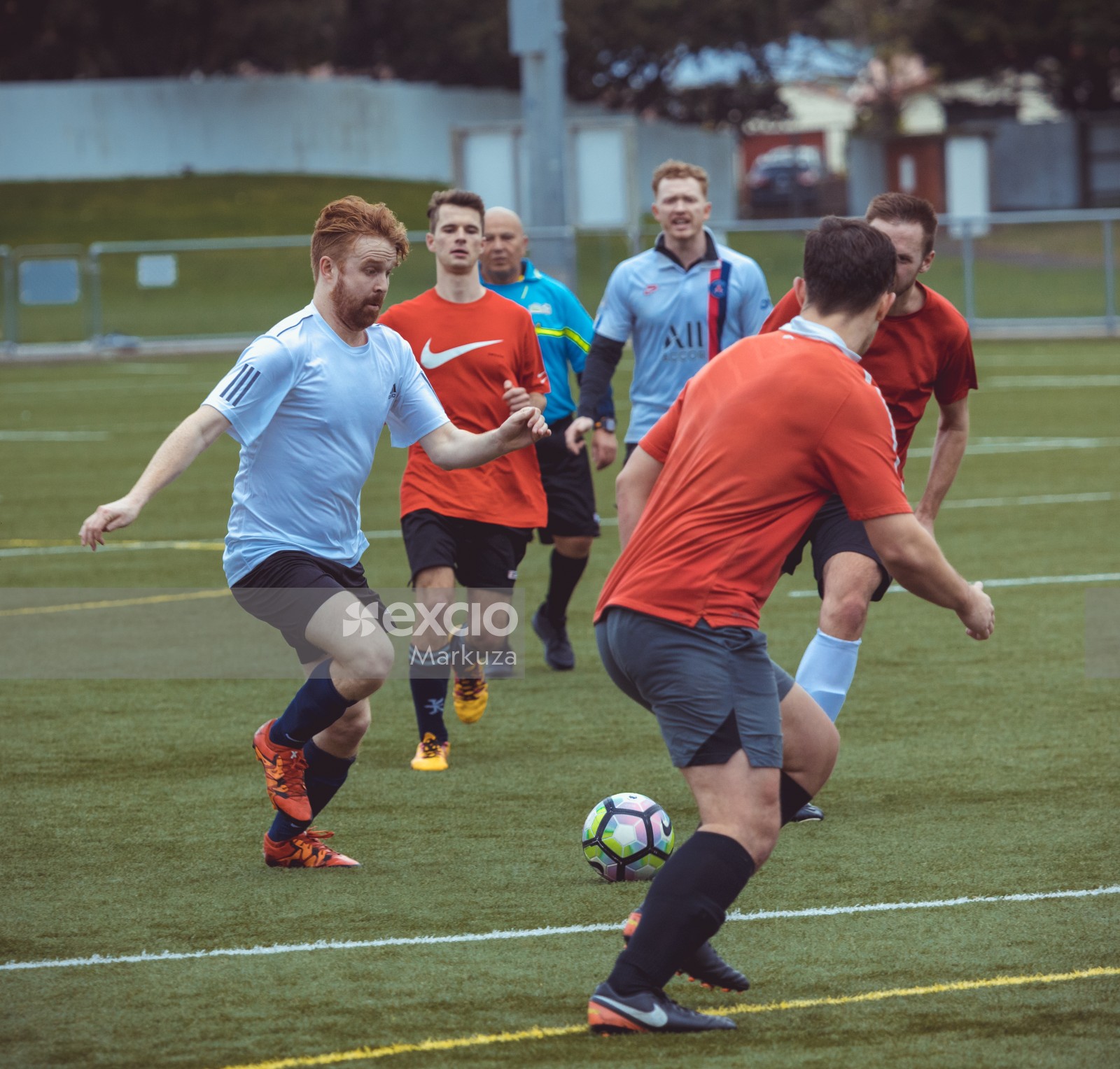 Red haired football player in white shirt - Sports Zone sunday league