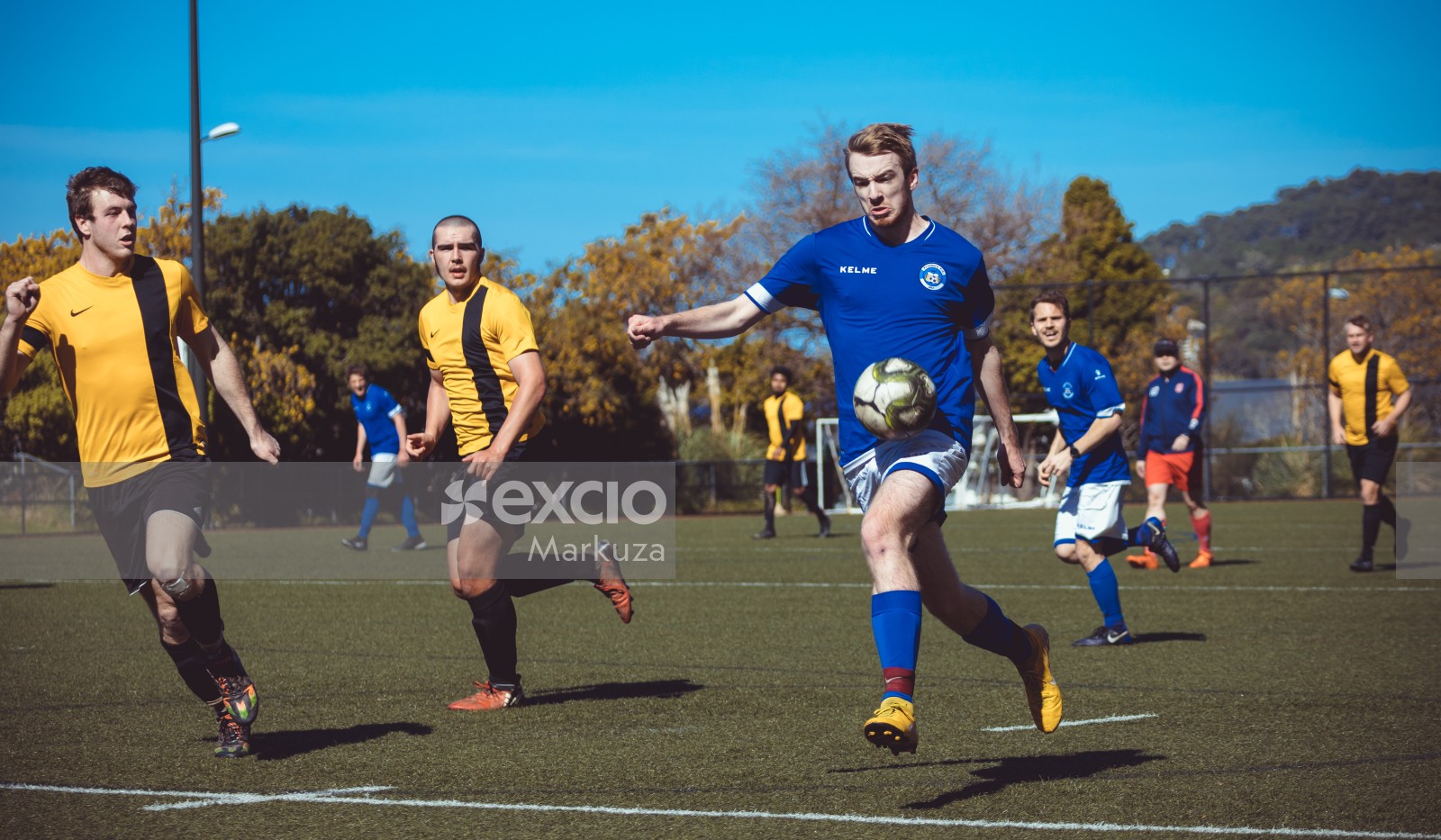 Frothers FC player in blue Kelme jersey - Sports Zone sunday league