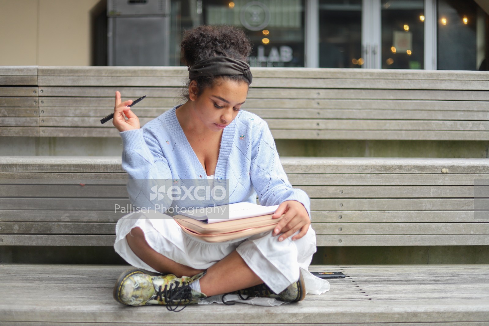 Young lady studying outside