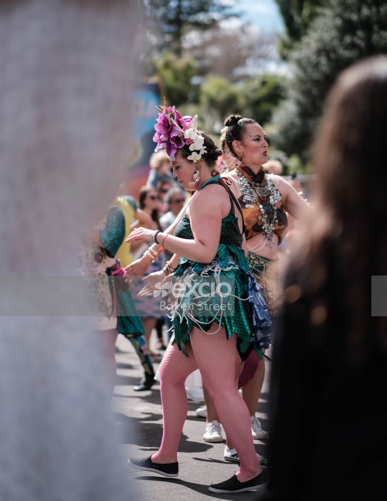 Women dancing in multi coloured dresses at Aro valley Fair 2021