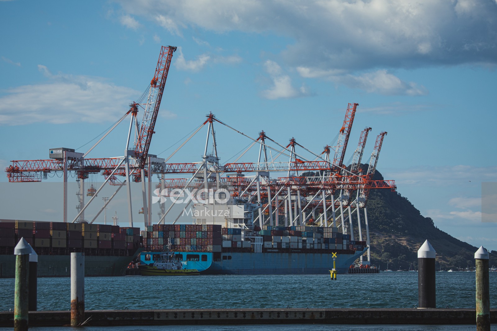 Containers, ship and cranes