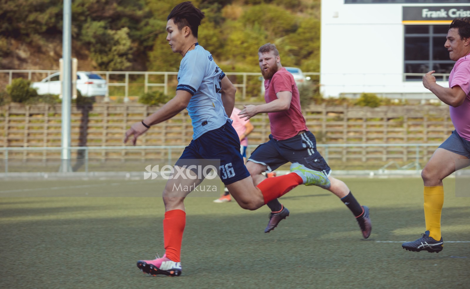 Football player in two different coloured cleats - Sports Zone sunday league