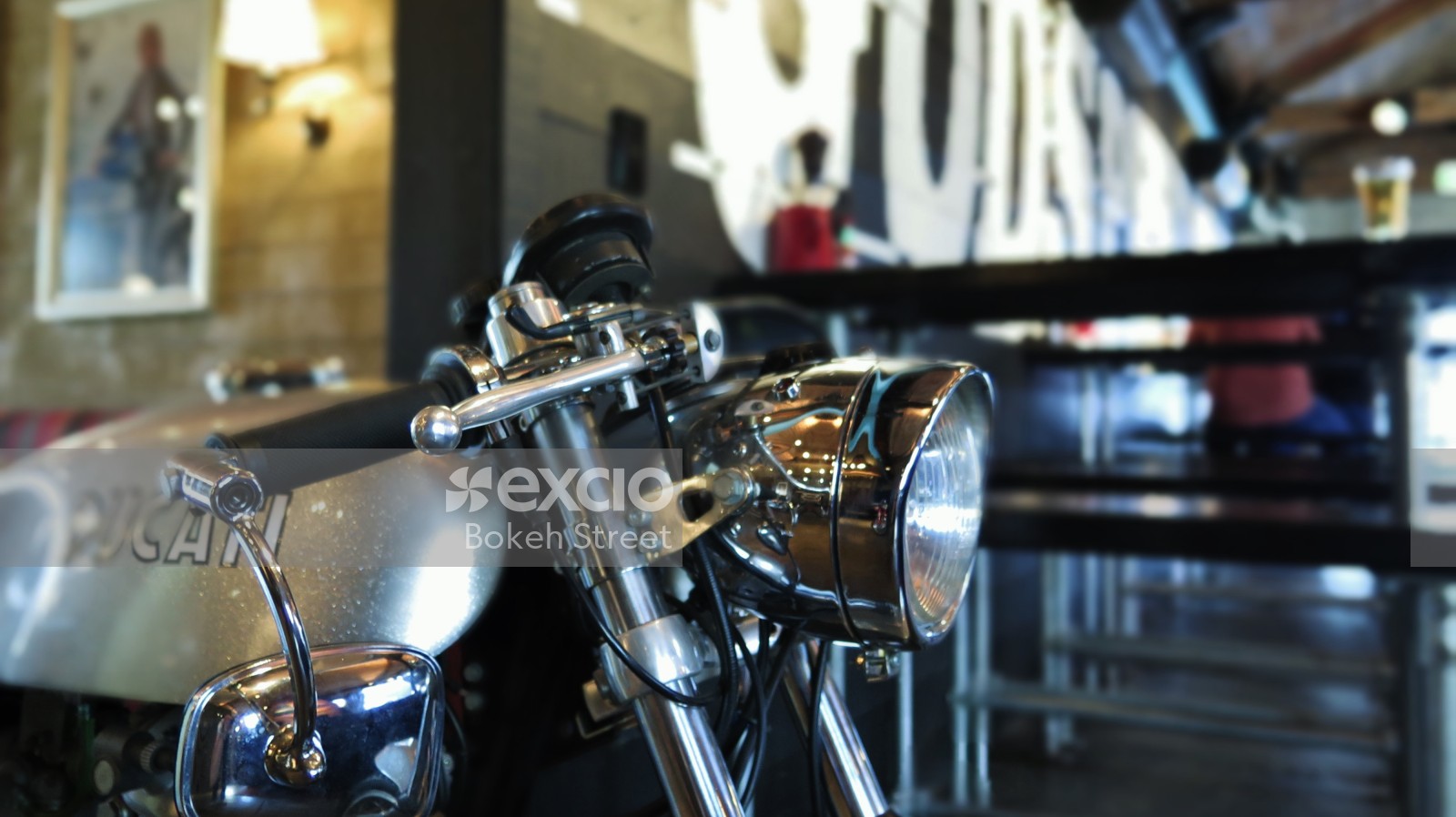 Silver Ducati motorcycle bokeh