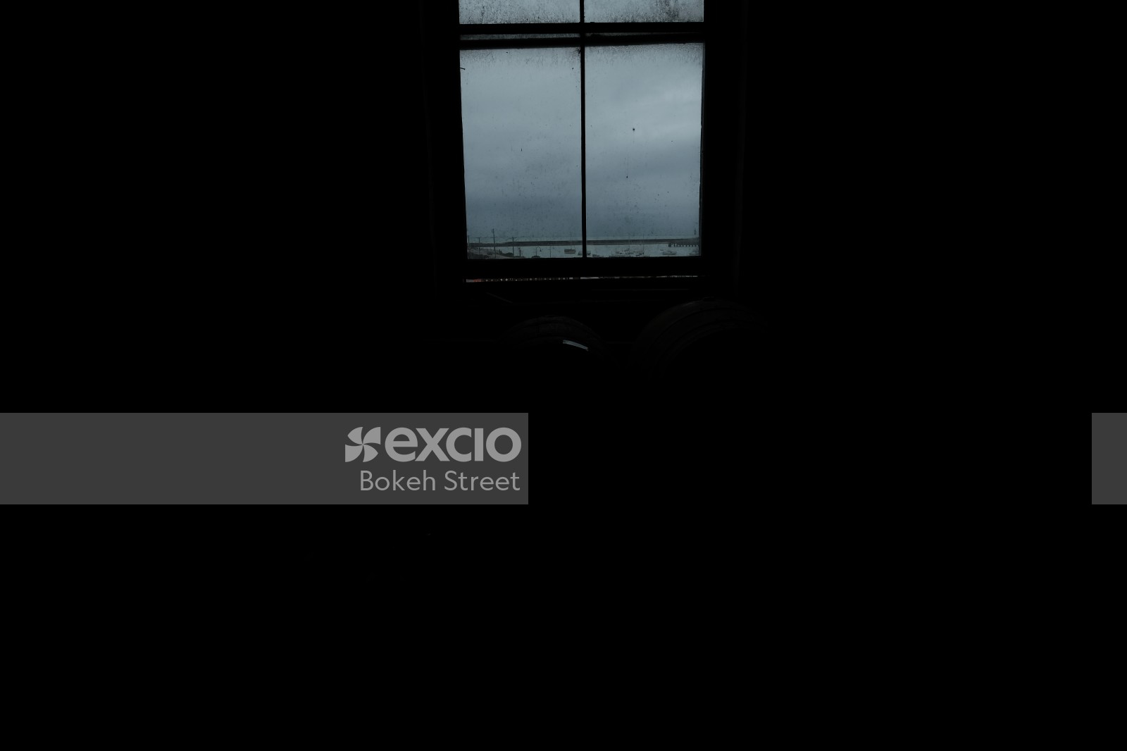 Brightness outside a dark room's window