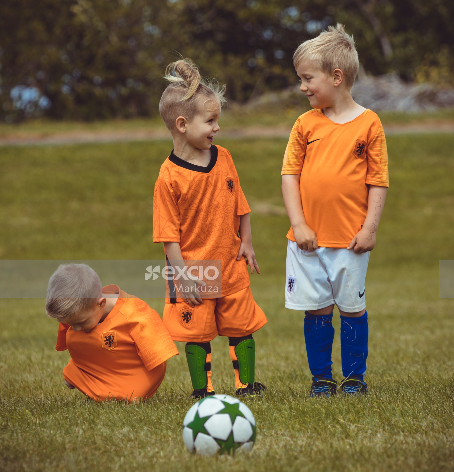Girl and two boys in Netherland kit - Little Dribblers