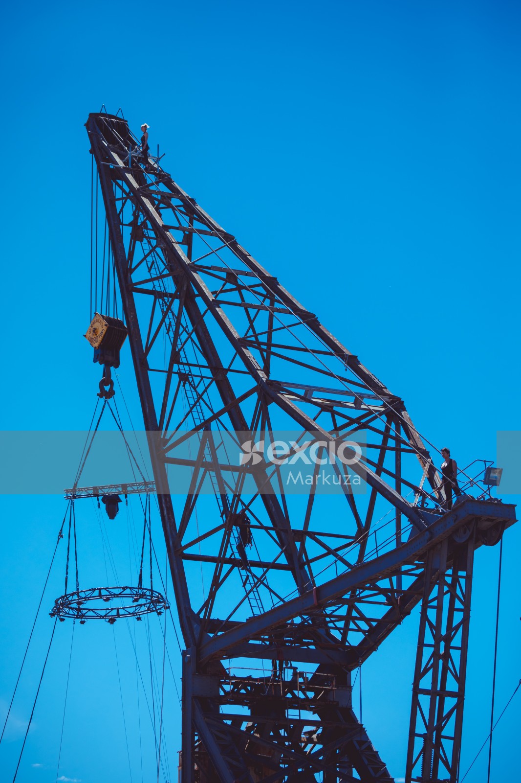 Performers on a large crane