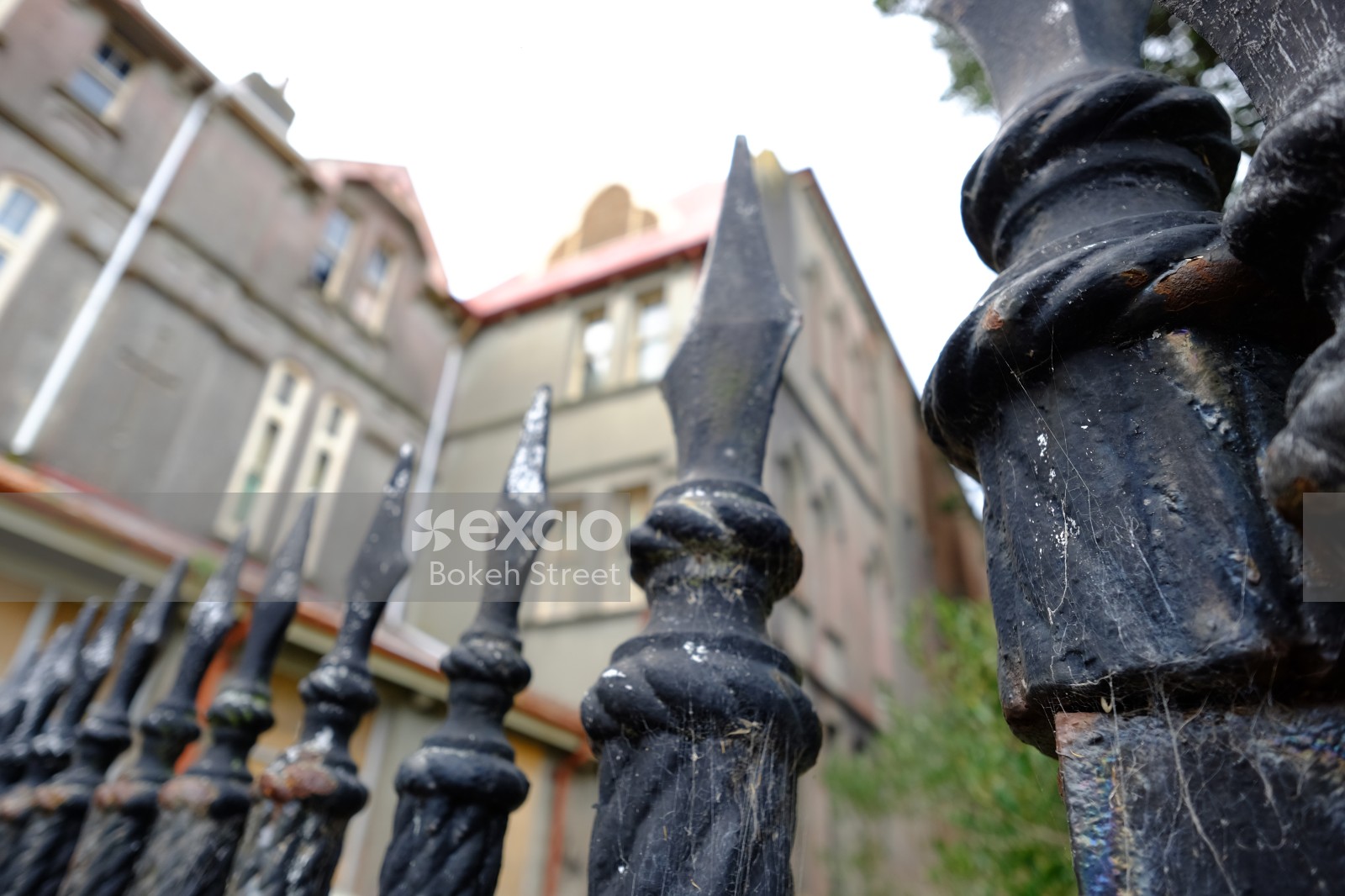 Iron railings in front of property