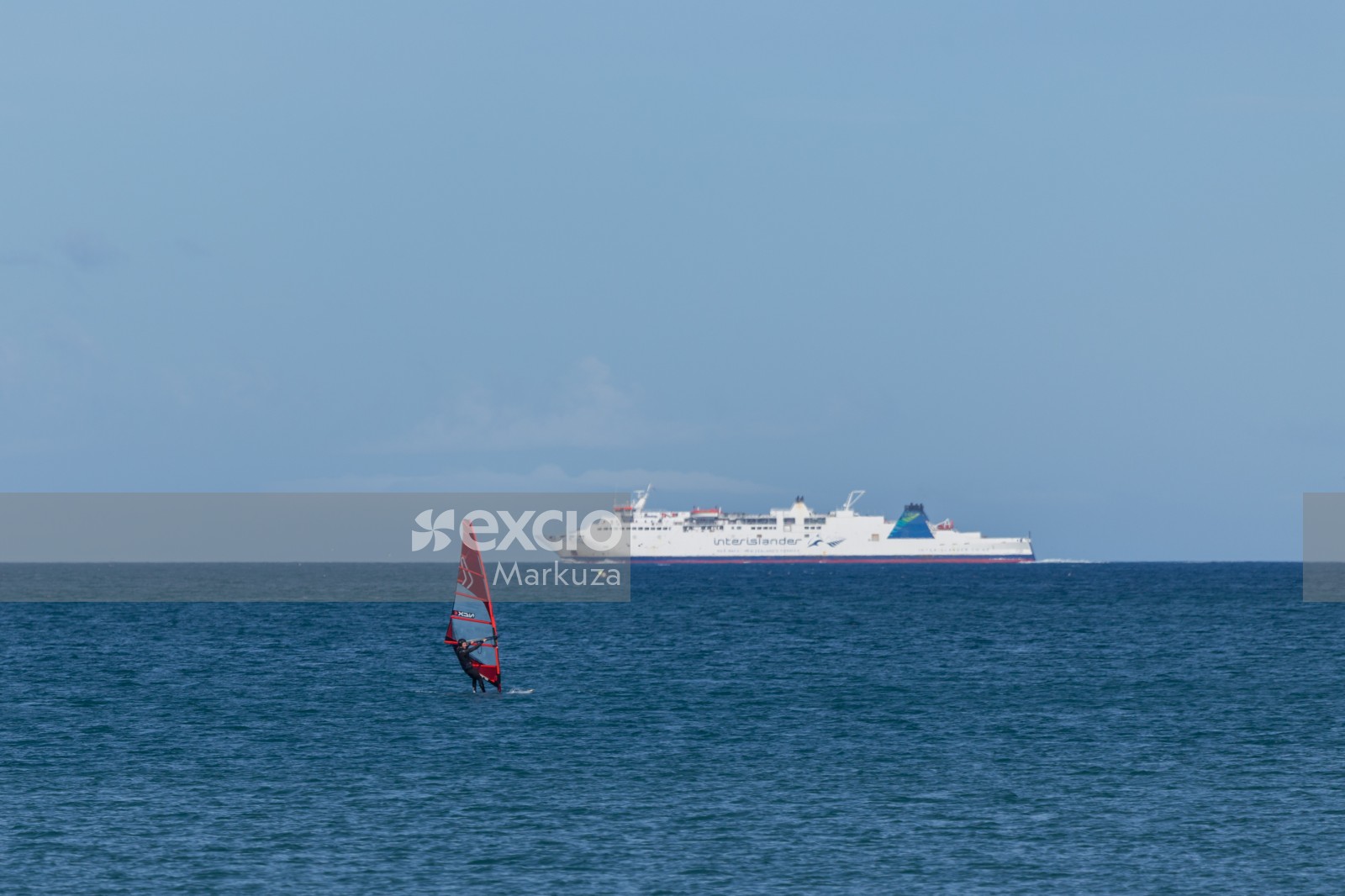 Windsurfer across the strait and Interislander ferry