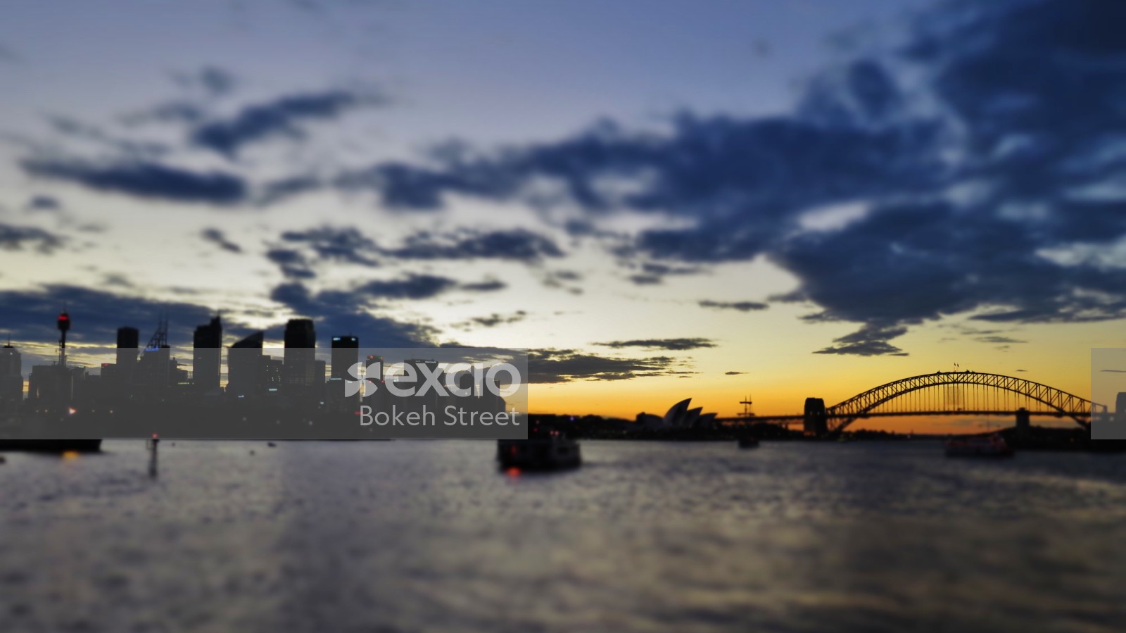 City silhouette sunset at Harbour bridge Sydney