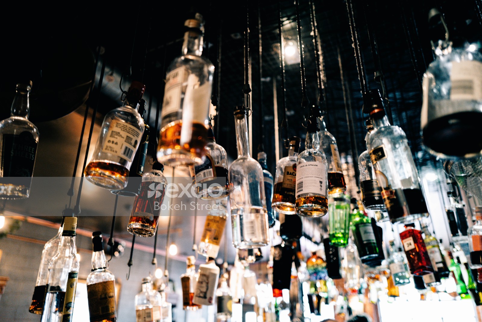 Liquor Bottles hanging from the ceiling
