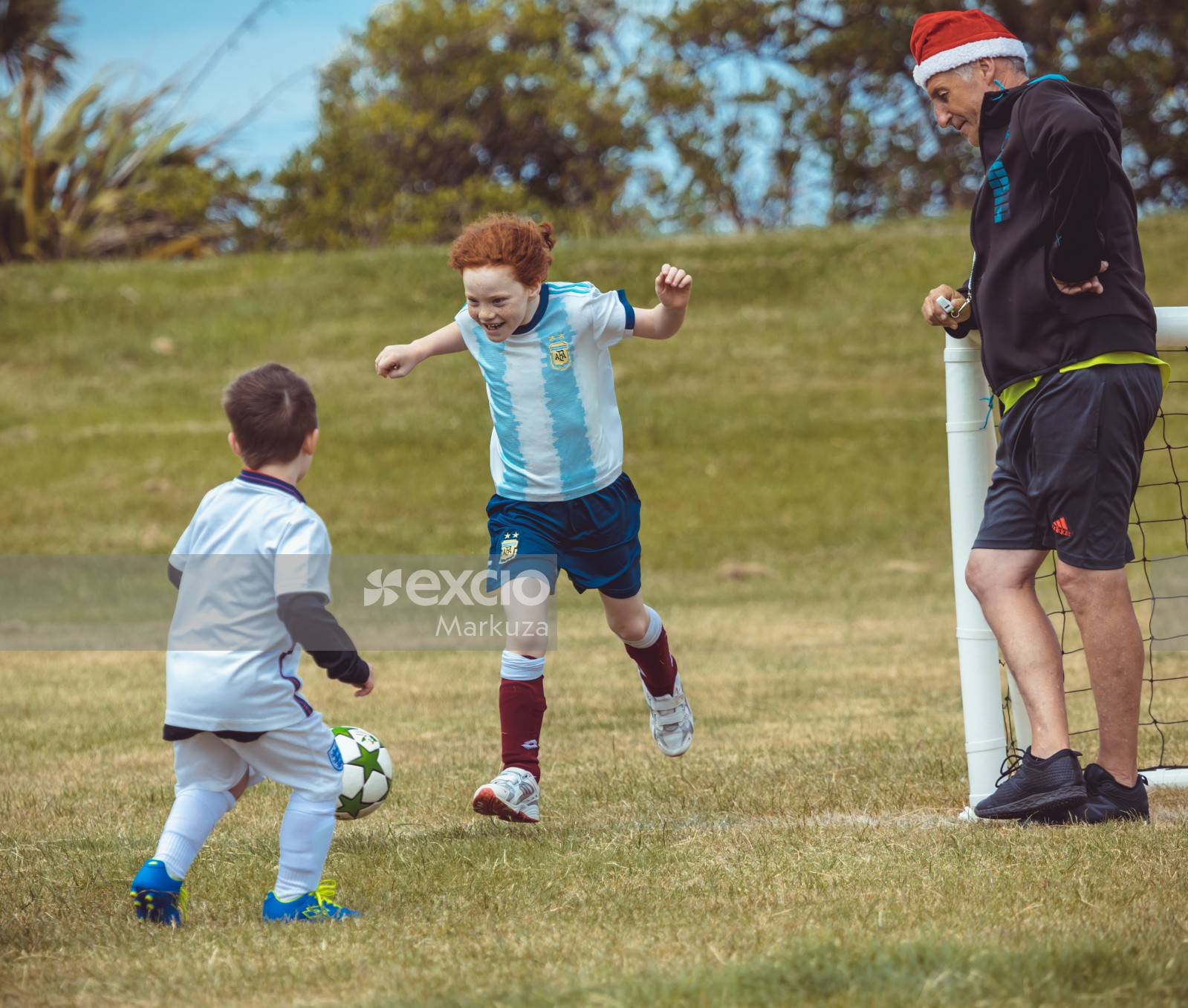 Little ginger girl playing football - Little Dribblers