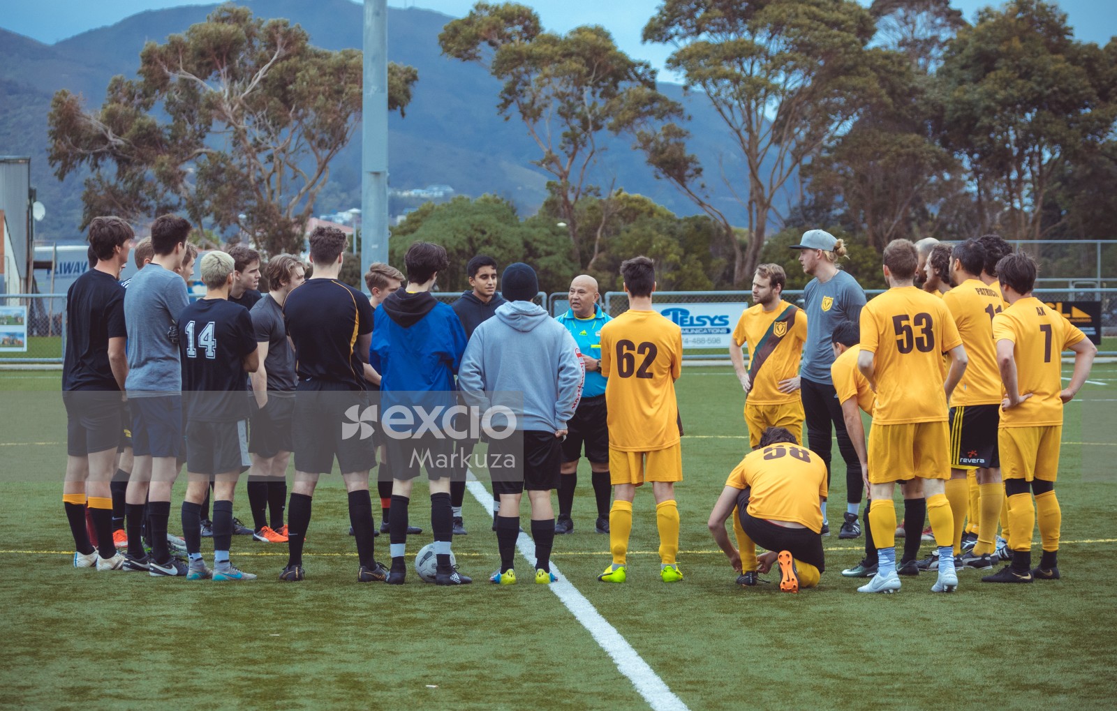 Referee addressing both teams before a football match - Sports Zone sunday league