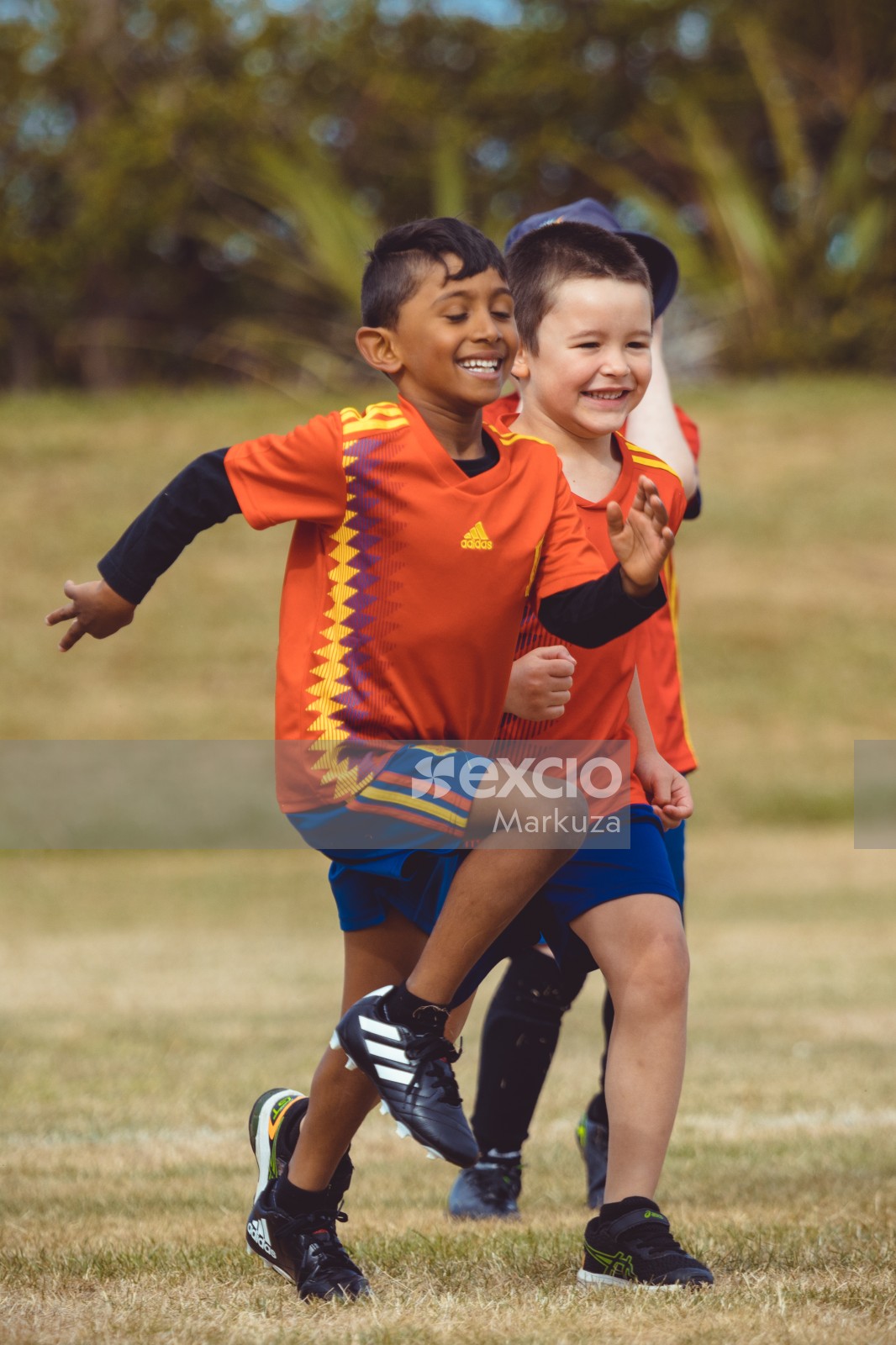 Young boys in Manchester United kit running at Little Dribblers