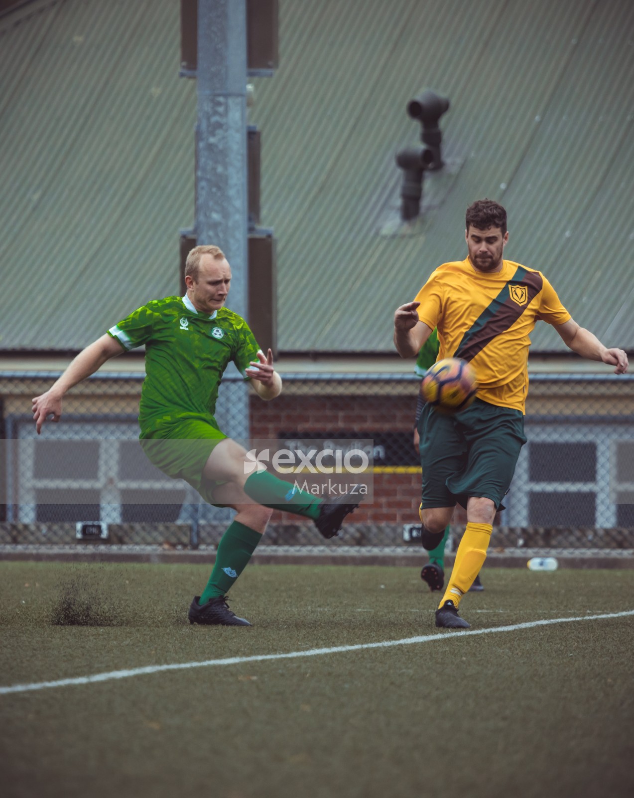 Player in green kit shooting football - Sports Zone sunday league
