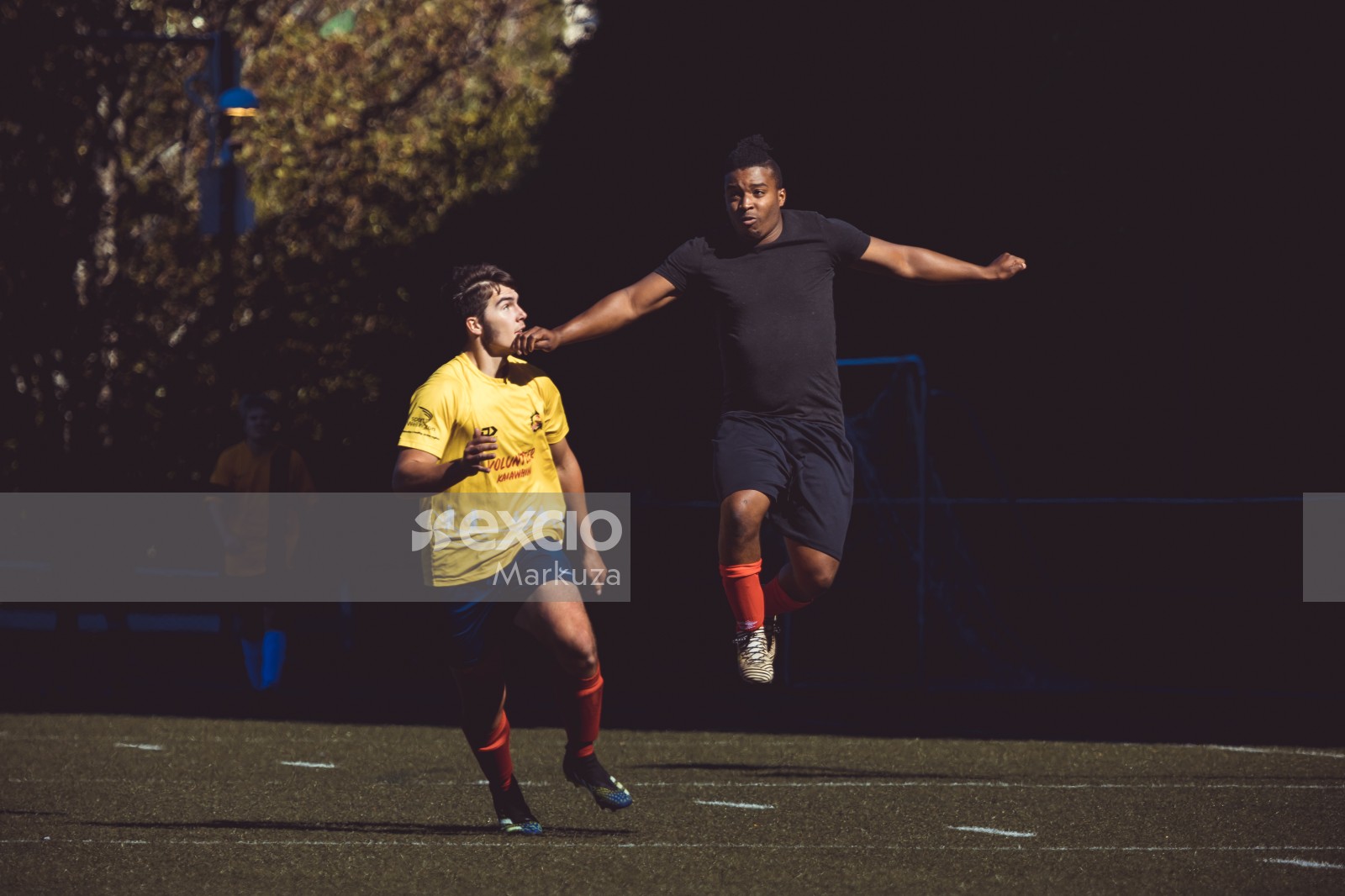 Football player jumps while running - Sports Zone sunday league