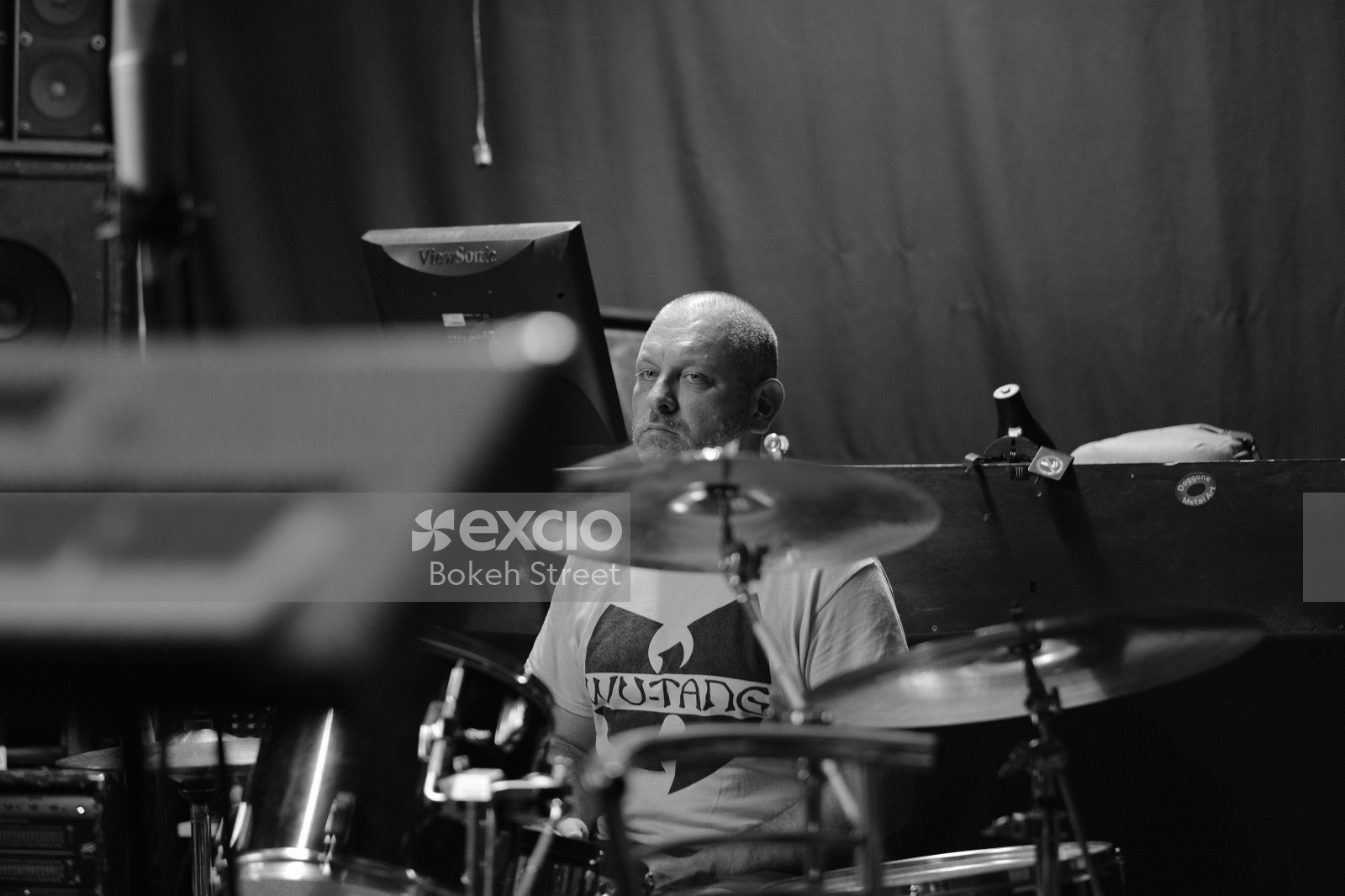 Drummer of band "Vietnam" in wu-tang shirt monochrome